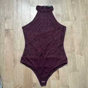 Never worn tags removed wine colored high neck lace body suit